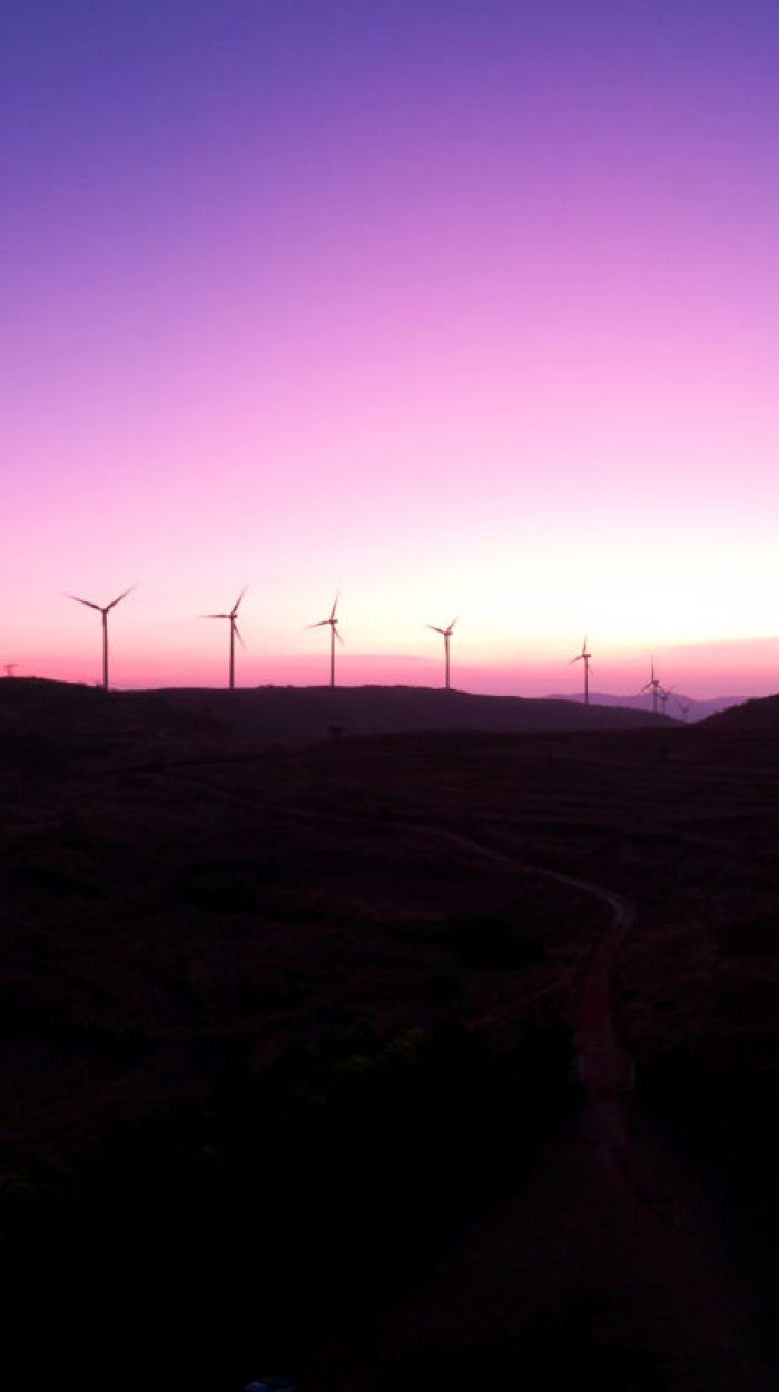 Wind turbines equipped with ADLS at dusk